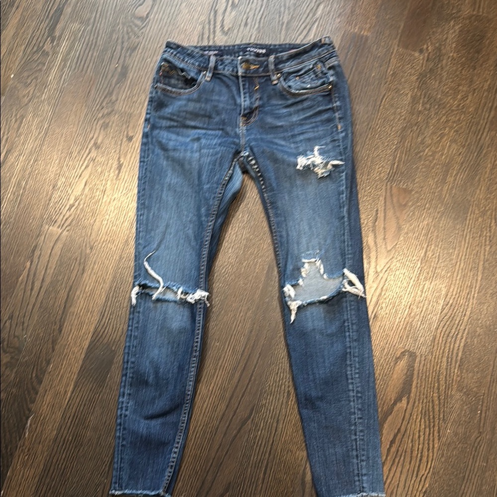 Distressed Blue Jeans